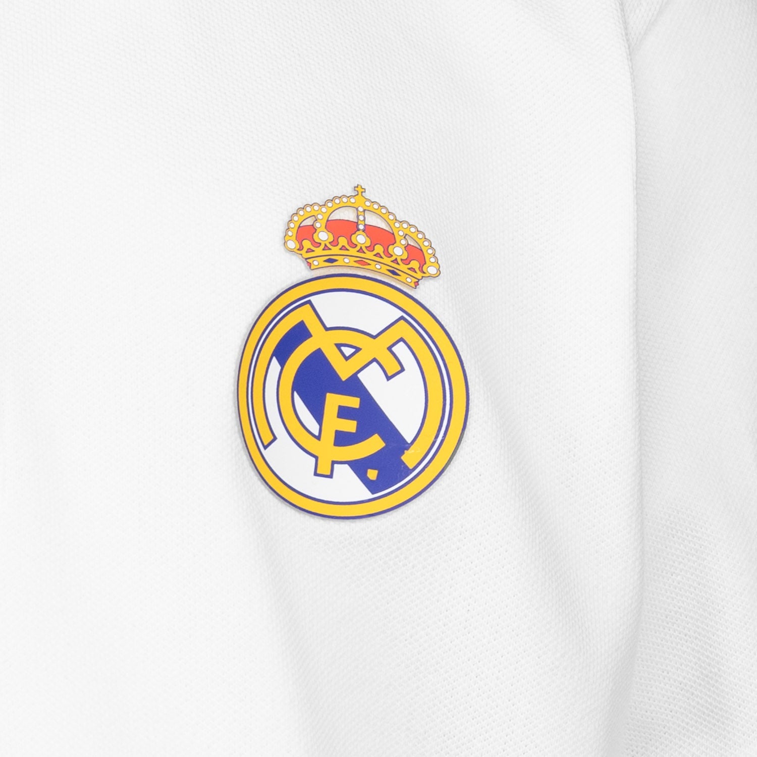 Polo Niños ECO Essentials Real Madrid Escudo Color Blanco